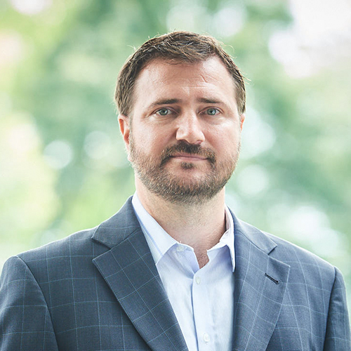 johno Headshot of John O'laughlin the presenting real estate agent